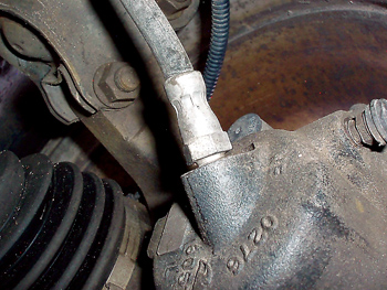 photo 6: brake hoses usually begin to crack at or near the metal ferrule attaching the hose to the brake caliper. 