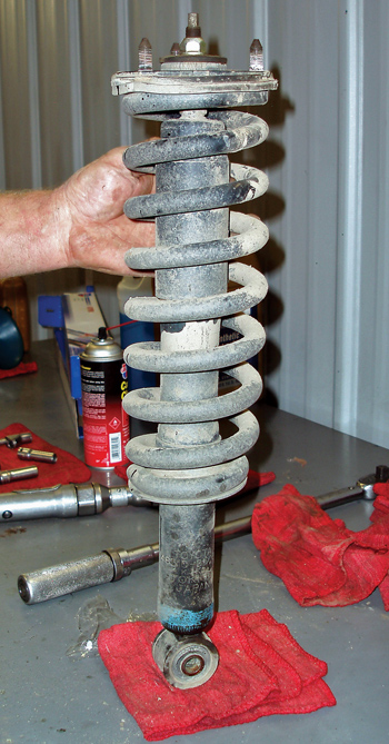 photo 3: servicing coil-over shock assemblies is similar to servicing conventional macpherson struts.