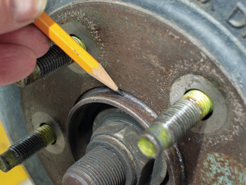 soak the axle hub with quality penetrating oil before removing the brake drum. a light coat of synthetic caliper grease ­applied to the hub will help prevent corrosion after the drum is ­re-installed.