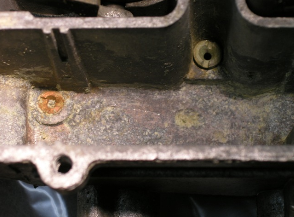 here we see the damage that water and ethanol can do to a carburetor bowl. rust and corrosion are common.