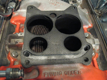 many of the pre-1970 general motors v8 ¬engines had exhaust passages that traveled across the base plate of their carburetors. many tuners block this exhaust passage in an effort to reduce carburetor heat and reduce the failure rate of the rubber and plastic parts that are in most carburetors.