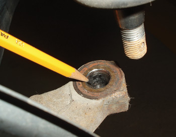 photo 4: before installing the tie rod end, make sure that the tapered mounting hole in the steering knuckle is clean and free of oil or grease.