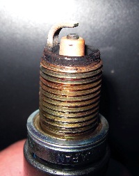 Photo 4: OEM spark plug at 100K.