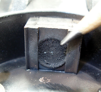 Here again, the photo doesn’t show the obvious contact between the cam synch shutter and CMP magnet, but it does show an accumulation of steel ­filings, indicating shaft and bushing wear. 