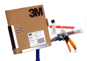 3m's wheel weight system, which includes a roll of weights, a stand and a cutting device designed to measure the weight needed to the nearest gram.