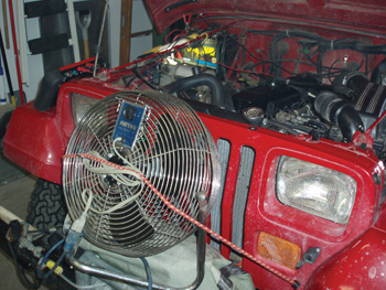 photo 1: in addition to diagnosing the cranking, no-start condition, i also had to be ready to break in the jeep’s special-grind, flat-tappet camshaft if the engine started. the fan is used to help cool the radiator.