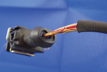 photo 8a: injector and sensor wiring is susceptible to heat damage and degradation of the insulation.
