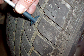photo 4: tire inspection can lead to added tire sales. tread wear should be measured and compared against new tire tread depths. 