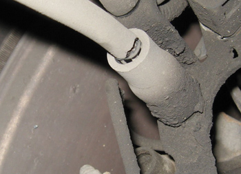Photo 10: Cracking of the brake flex lines is very common on these cars.
