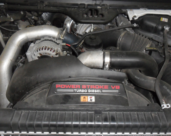 this is the engine that owners see when looking under the hood of the 2003 ford super duty truck. the 7.3 was replaced by the 6.0 that would make its mark on the mid-size diesel truck market, but not in a good way.