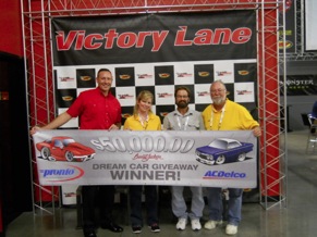 Left to right: Dan Garrison, ACDelco Market Area Manager; Kerri Gulick, National Pronto Association, Grand Prize Winner Terry Burnah of Beard's 66; and Bill Maggs, president of National Pronto Association.
