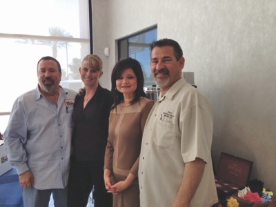 pictured from left: allan stock, radio talk-show host; tracy dursky, beasley broadcasting rep; deborah scandura, owner’s wife; and frank scandura, owner.
