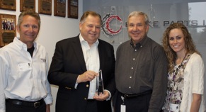 David Overbeeke, second from left, accepts the award on behalf of BPI.