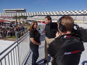 ZF Race Reporter, Tony Rizzuti (middle), interviews ZF Fan Reporter, Sharon Ptak (left), at Daytona International Speedway for the kick-off to the ZF Race Reporter program.