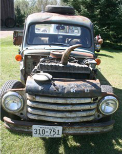 Roger Rentola's truck was made from several trucks, vans, cars and a school bus. It includes a beer keg, cow horn and an antique Boy Scout canteen. (Jana Peterson / Pine Journal)