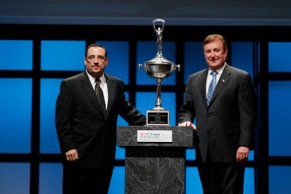 Mike Proud, (left) of Federal-Mogul, presents the Buddy Shuman award to Richard Childress.